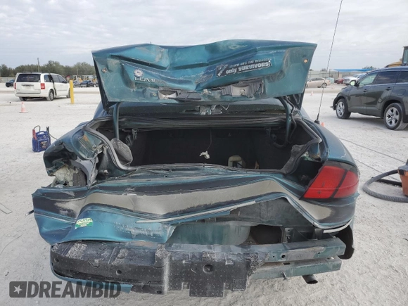 1997 Chevrolet Lumina LS with VIN 2G1WL52M1V9120300, listed as a Copart auction lot 87460394 with 142,588 mi miles and Salvage Title. Bid and sale history available at DreamBid. Image 6.