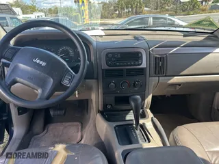 2004 Jeep Grand Cherokee Laredo with VIN 1J4GX48N24C436753, listed as a Copart auction lot 45039845 with 114,024 mi miles and Clean Title. Bid and sale history available at carsss.com. Image 9.