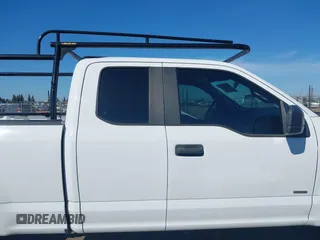 2017 Ford F-150 XL with VIN 1FTEX1CG2HKC93299, listed as a IAAI auction lot 41675673 with 101,726 mi miles. Bid and sale history available at carsss.com. Image 13.