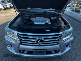 2013 Lexus LX 570 with VIN JTJHY7AXXD4091614, listed as a Copart auction lot 82096184 with 205,635 mi miles and Clean Title. Bid and sale history available at DreamBid. Image 7.