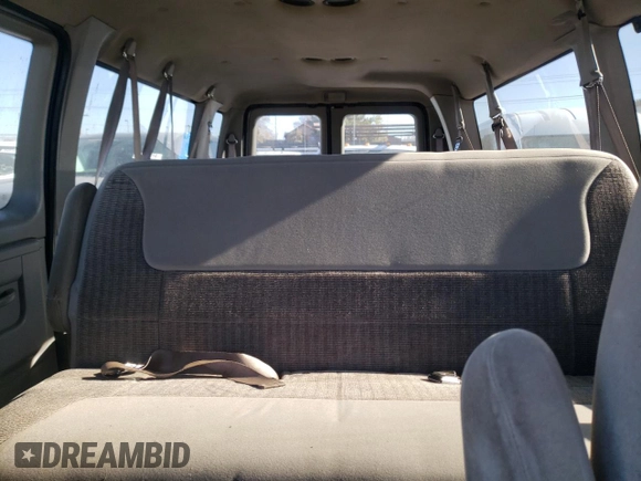 1999 Ford Econoline Passenger XL with VIN 1FBSS31L6XHB60672, listed as a Copart auction lot 79319714 with 295,551 mi miles and Clean Title. Bid and sale history available at DreamBid. Image 10.