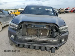2021 Toyota Tacoma 4WD SR5 with VIN 5TFDZ5BN8MX062787, listed as a Copart auction lot 82918264 with 59,351 mi miles and Salvage Title. Bid and sale history available at carsss.com. Image 5.