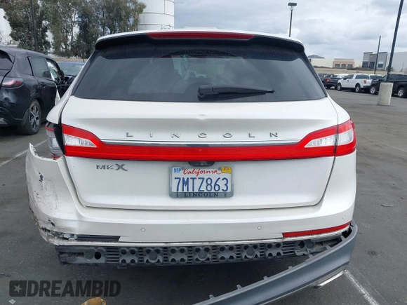 2016 Lincoln MKX Select with VIN 2LMTJ6KR5GBL30010, listed as a IAAI auction lot 41741385 with 112,647 mi miles. Bid and sale history available at carsss.com. Image 16.