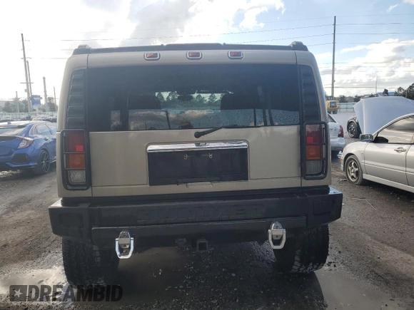 2003 Hummer H2 with VIN 5GRGN23U13H147071, listed as a Copart auction lot 82255674 with 272,215 mi miles and Salvage Title. Bid and sale history available at carsss.com. Image 6.