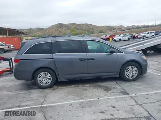 2014 Honda Odyssey LX with VIN 5FNRL5H28EB101376, listed as a IAAI auction lot 41772529 with 122,504 mi miles. Bid and sale history available at carsss.com. Image 13.