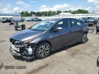 2017 Toyota Prius Plus z VIN JTDKARFPXH3034813, wystawiony jako Copart lot #61381075 z przebiegiem 99 258 mil mil oraz Szkoda całkowita • Salvage title. Historia ofert i sprzedaży dostępna na DreamBid. Obrazek 1.