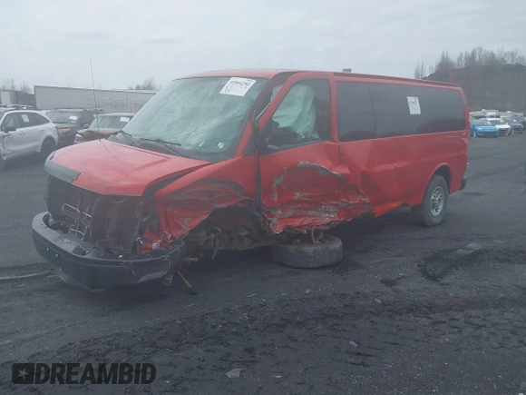 2013 Chevrolet Express Passenger 1LS z VIN 1GAZGZFA0D1175302, wystawiony jako IAAI lot #41966297 z przebiegiem 89 514 mil mil oraz . Historia ofert i sprzedaży dostępna na DreamBid. Obrazek 2.