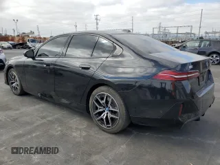 2024 BMW i5 eDrive40 z VIN WBY33FK01RCR58515, wystawiony jako Copart lot #76064474 z przebiegiem 19 000 mil mil oraz Szkody całkowita. Historia ofert i sprzedaży dostępna na DreamBid. Obrazek 2.