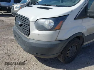 2018 Ford Transit with VIN 1FTYE1CMXJKA35806, listed as a IAAI auction lot 41652642 with 200,828 mi miles and . Bid and sale history available at DreamBid. Image 17.