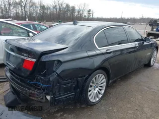 2011 BMW 7 Series 750Li xDrive with VIN WBAKC8C52BC431668, listed as a IAAI auction lot 41623575 with 117,306 mi miles. Bid and sale history available at carsss.com. Image 4.