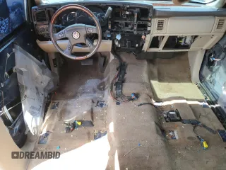 2005 Cadillac Escalade z VIN 1GYEK63N15R156958, wystawiony jako Copart lot #55286165 z przebiegiem Nie podano mil oraz Czysty tytuł • Clean title. Historia ofert i sprzedaży dostępna na DreamBid. Obrazek 8.
