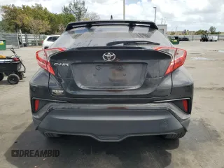 2018 Toyota C-HR XLE with VIN NMTKHMBX1JR015428, listed as a Copart auction lot 51111425 with 95,500 mi miles and Salvage Title. Bid and sale history available at carsss.com. Image 6.
