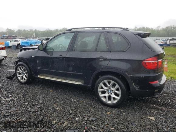 2012 BMW X5 35i with VIN 5UXZV4C57CL765053, listed as a Copart auction lot 59997275 with 157,943 mi miles and Salvage title. Bid and sale history available at DreamBid. Image 2.