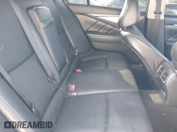 2014 Infiniti Q50 with VIN JN1BV7AP4EM677506, listed as a IAAI auction lot 40113207 with 142,446 mi miles and . Bid and sale history available at DreamBid. Image 8.