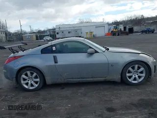 2005 Nissan 350Z Touring with VIN JN1AZ34E85M652465, listed as a IAAI auction lot 41418161 with 153,099 mi miles. Bid and sale history available at carsss.com. Image 13.