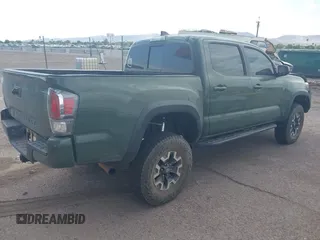 2021 Toyota Tacoma SR z VIN 3TYCZ5AN2MT049069, wystawiony jako IAAI lot #42116964 z przebiegiem 96 275 mil mil oraz . Historia ofert i sprzedaży dostępna na DreamBid. Obrazek 4.