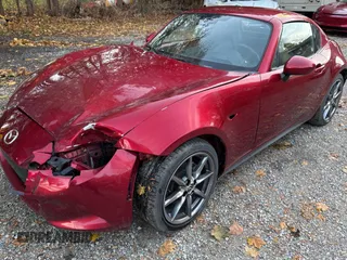 2021 Mazda MX-5 Miata Grand Touring z VIN JM1NDAM74M0461263, wystawiony jako Copart lot #81410634 z przebiegiem 44 551 mil mil oraz Szkoda całkowita • Salvage title. Historia ofert i sprzedaży dostępna na DreamBid. Obrazek 2.