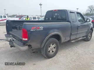 2002 Ford F-150 XL with VIN 1FTRX18W22NA26073, listed as a IAAI auction lot 42126819 with 212,893 mi miles and . Bid and sale history available at DreamBid. Image 4.