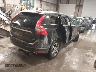 2014 Volvo XC60 R-Design Premier Plus with VIN YV4902DZ7E2537839, listed as a IAAI auction lot 41570128 with 8,858 mi miles and . Bid and sale history available at DreamBid. Image 4.