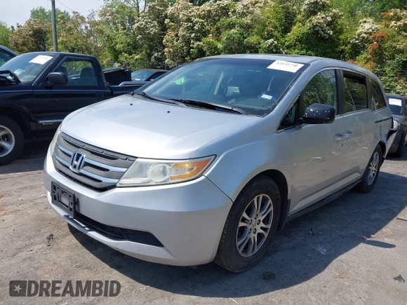 2011 Honda Odyssey EX-L with VIN 5FNRL5H62BB075789, listed as a IAAI auction lot 42035746 with 238,616 mi miles and . Bid and sale history available at carsss.com. Image 2.