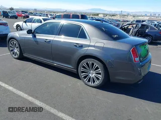 2013 Chrysler 300 with VIN 2C3CCABT4DH644186, listed as a IAAI auction lot 41693442 with 102,802 mi miles. Bid and sale history available at carsss.com. Image 3.