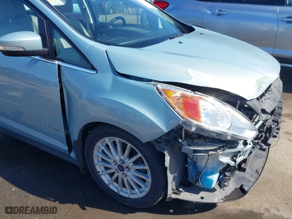 2013 Ford C-Max Hybrid SEL with VIN 1FADP5BUXDL521814, listed as a IAAI auction lot 41944352 with 130,999 mi miles. Bid and sale history available at carsss.com. Image 18.