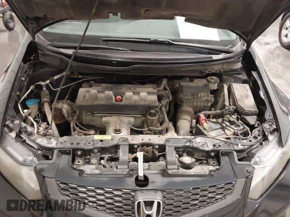 2012 Honda Civic Cpe LX with VIN 2HGFG3B55CH559433, listed as a IAAI auction lot 42045526 with 152,159 mi miles. Bid and sale history available at carsss.com. Image 10.