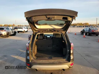 2017 Ford Escape SE with VIN 1FMCU0G91HUE07265, listed as a Copart auction lot 84231444 with 82,990 mi miles and Clean Title. Bid and sale history available at DreamBid. Image 6.