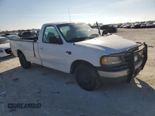 2000 Ford F-150 XL with VIN 1FTRF17W0YKA31819, listed as a Copart auction lot 85775044 with 214,945 mi miles and Clean title. Bid and sale history available at DreamBid. Image 4.