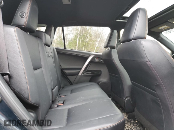 2018 Toyota RAV4 Hybrid SE with VIN JTMJJREV6JD225530, listed as a Copart auction lot 52000985 with 150,642 mi miles and Salvage title. Bid and sale history available at DreamBid. Image 11.