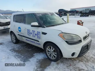 2012 Kia Soul + with VIN KNDJT2A67C7385160, listed as a IAAI auction lot 41533032 with 166,094 mi miles. Bid and sale history available at carsss.com. Image 1.
