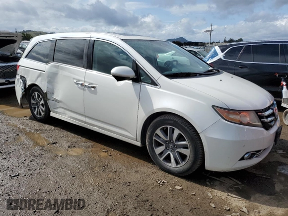 2014 Honda Odyssey Touring with VIN 5FNRL5H97EB097771, listed as a Copart auction lot 51664455 with 109,830 mi miles and Salvage Title. Bid and sale history available at DreamBid. Image 4.