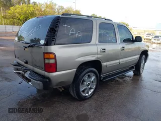2003 Chevrolet Tahoe LS z VIN 1GNEC13Z73R121712, wystawiony jako IAAI lot #41754849 z przebiegiem Nie podano mil oraz . Historia ofert i sprzedaży dostępna na DreamBid. Obrazek 4.