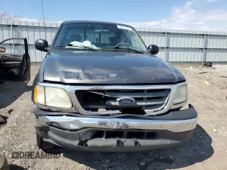 2003 Ford F-150 XL with VIN 1FTRX17L43NA66874, listed as a Copart auction lot 50741395 with 196,161 mi miles and Salvage title. Bid and sale history available at DreamBid. Image 5.