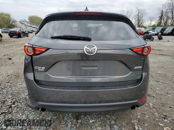 2019 Mazda CX-5 Signature with VIN JM3KFBEY3K0521581, listed as a Copart auction lot 53112925 with 62,977 mi miles and Salvage Title. Bid and sale history available at carsss.com. Image 6.