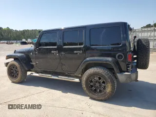 2016 Jeep Wrangler Unlimited Rubicon with VIN 1C4BJWFG5GL290757, listed as a Copart auction lot 52099225 with 102,424 mi miles and Salvage title. Bid and sale history available at DreamBid. Image 2.