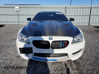 2017 BMW M6 z VIN WBS6E9C56HG437410, wystawiony jako Copart lot #80217694 z przebiegiem 68 335 mil mil oraz Szkoda całkowita • Salvage title. Historia ofert i sprzedaży dostępna na DreamBid. Obrazek 5.
