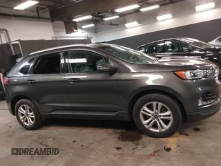 2020 Ford Edge SEL z VIN 2FMPK4J93LBA55165, wystawiony jako IAAI lot #42346860 z przebiegiem 72 201 mil mil oraz . Historia ofert i sprzedaży dostępna na DreamBid. Obrazek 13.