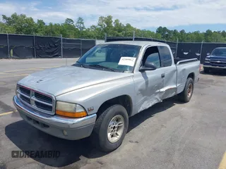 1999 Dodge Dakota SLT z VIN 1B7GL22X9XS258964, wystawiony jako IAAI lot #42309862 z przebiegiem 177 561 mil mil oraz . Historia ofert i sprzedaży dostępna na DreamBid. Obrazek 2.