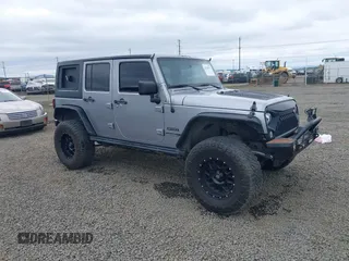 2018 Jeep Wrangler Unlimited Sport S with VIN 1C4BJWDG4JL861052, listed as a IAAI auction lot 42100517 with 43,907 mi miles and . Bid and sale history available at DreamBid. Image 1.