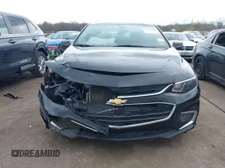 2018 Chevrolet Malibu LS with VIN 1G1ZB5STXJF242081, listed as a IAAI auction lot 42078562 with 146,752 mi miles and . Bid and sale history available at DreamBid. Image 12.