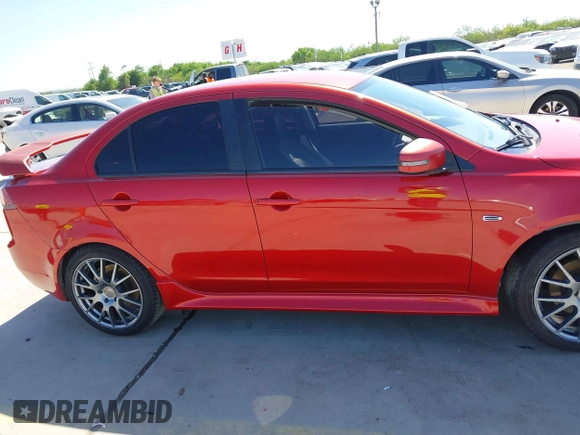 2015 Mitsubishi Lancer GT with VIN JA32U8FW9FU014308, listed as a IAAI auction lot 41982416 with 227,574 mi miles. Bid and sale history available at carsss.com. Image 13.