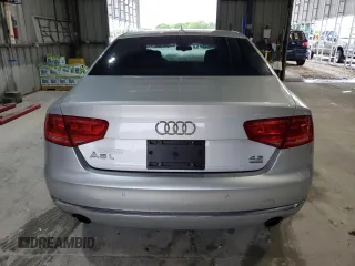 2012 Audi A8 z VIN WAURVAFD4CN038599, wystawiony jako Copart lot #59554025 z przebiegiem 93 334 mil mil oraz Szkoda całkowita • Salvage title. Historia ofert i sprzedaży dostępna na DreamBid. Obrazek 6.