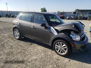 2012 MINI Countryman with VIN WMWZB3C58CWM03815, listed as a Copart auction lot 50097405 with 84,137 mi miles and Salvage Title. Bid and sale history available at DreamBid. Image 4.