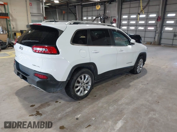 2015 Jeep Cherokee Limited with VIN 1C4PJMDS3FW728884, listed as a IAAI auction lot 41973663 with 112,719 mi miles. Bid and sale history available at carsss.com. Image 4.