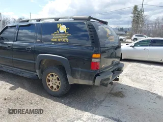 2004 Chevrolet Suburban Z71 with VIN 3GNFK16Z54G317104, listed as a IAAI auction lot 41729039 with 199,032 mi miles. Bid and sale history available at carsss.com. Image 3.