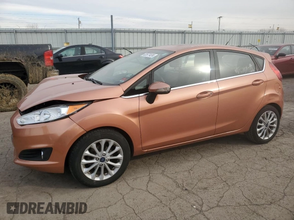 2017 Ford Fiesta Titanium with VIN 3FADP4FJ8HM164132, listed as a Copart auction lot 82577424 with 63,686 mi miles and Salvage Title. Bid and sale history available at DreamBid. Image 1.