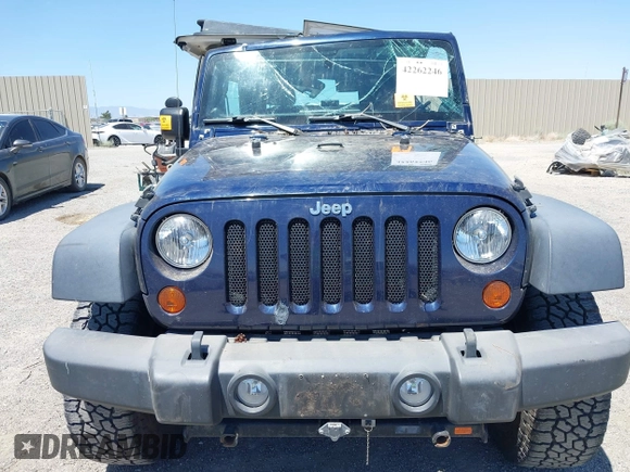 2013 Jeep Wrangler Sport with VIN 1C4AJWAG3DL627179, listed as a IAAI auction lot 42262246 with 33,536 mi miles and . Bid and sale history available at DreamBid. Image 12.