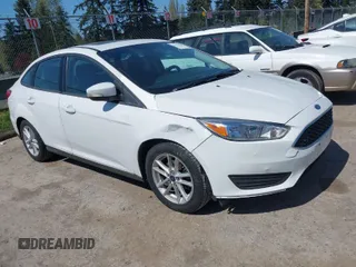 2016 Ford Focus SE with VIN 1FADP3F22GL272491, listed as a IAAI auction lot 42042160 with 140,355 mi miles. Bid and sale history available at carsss.com. Image 1.
