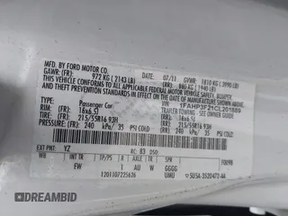 2012 Ford Focus SE with VIN 1FAHP3F21CL201889, listed as a IAAI auction lot 42070260 with 126,650 mi miles. Bid and sale history available at carsss.com. Image 9.
